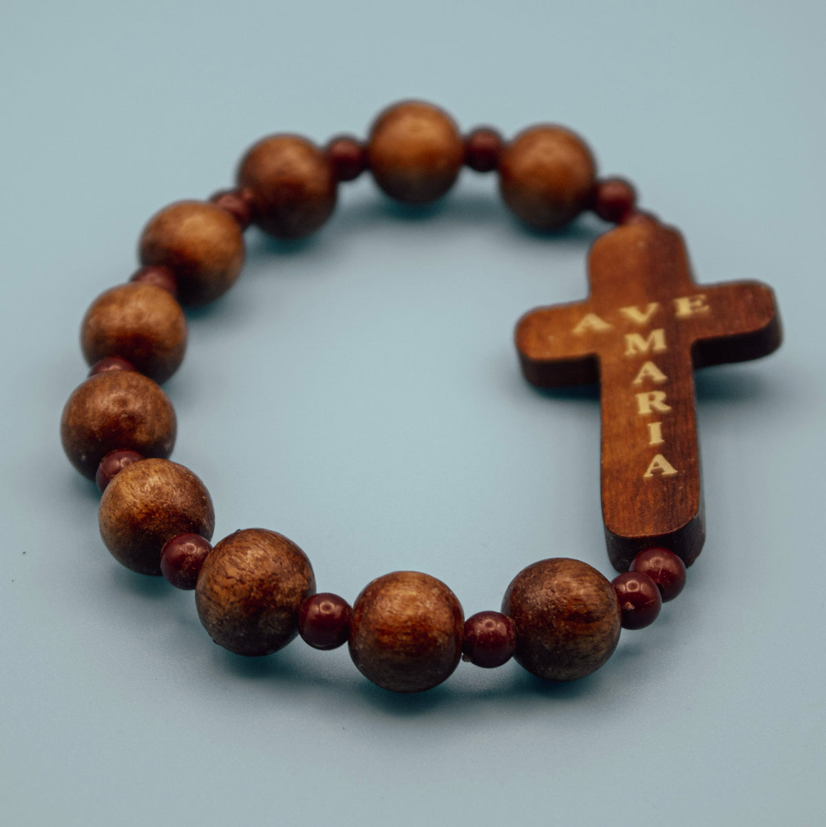 1. Close-up of Ave Maria cross on wooden decade Rosary bracelet
