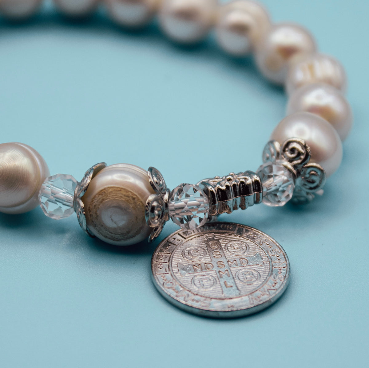 Saint Benedict Medal on pearl-style Catholic rosary bracelet