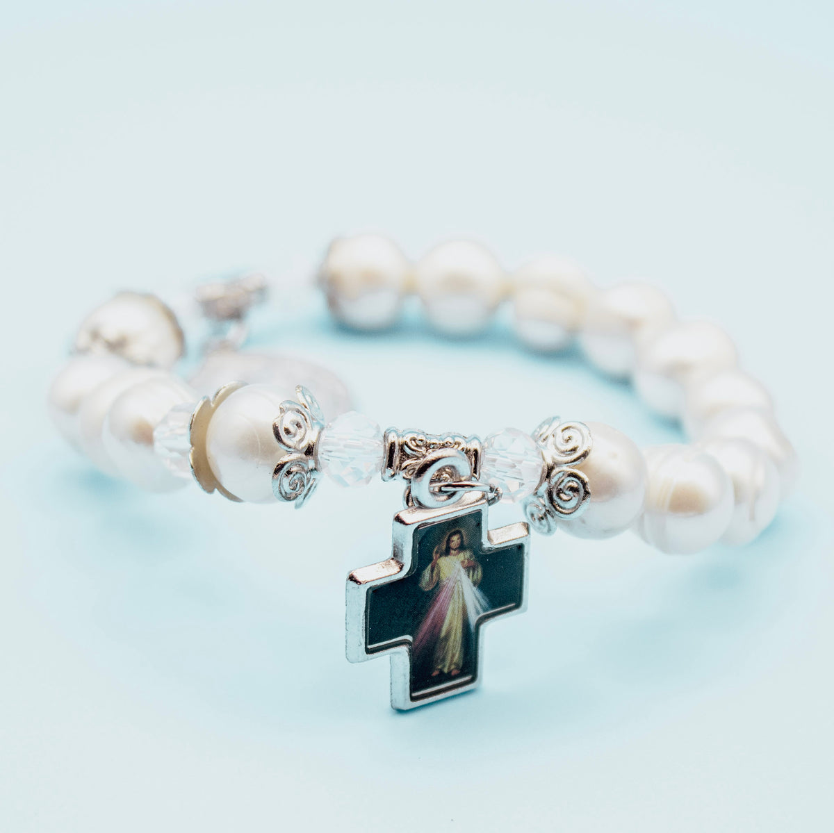 Divine Mercy devotional cross on pearl-style rosary bracelet