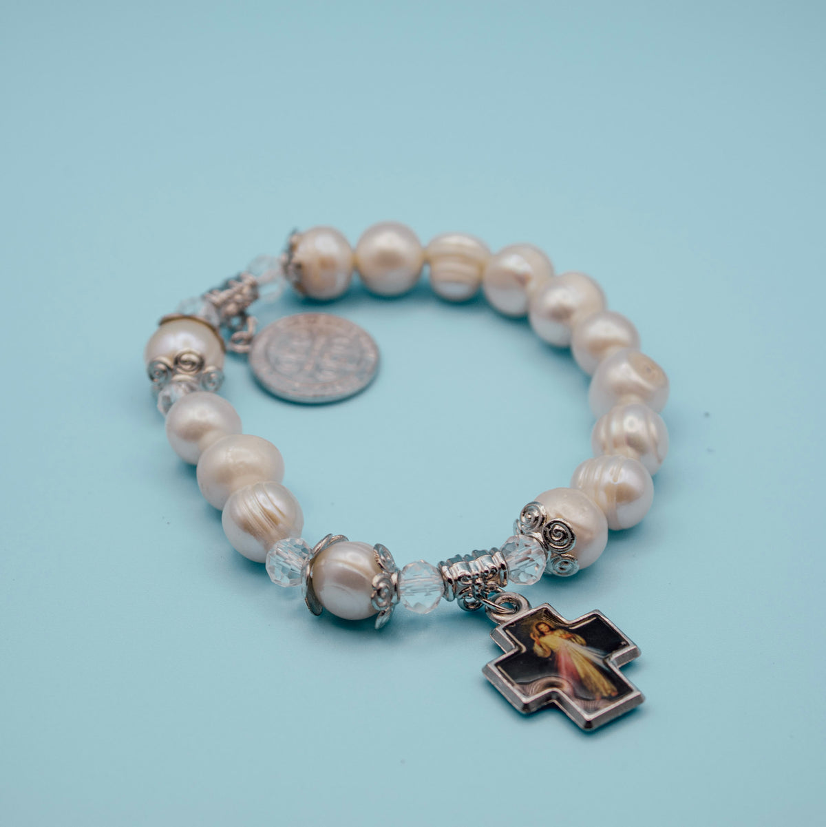 - Divine Mercy rosary bracelet with pearl-style beads