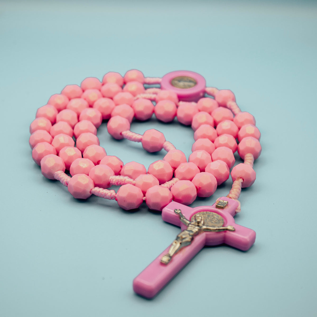 Pink Catholic Rosary with faceted beads and Saint Benedict Medal