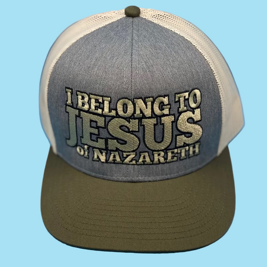 Cap with 'I Belong to Jesus in Nazareth' text on a blue background